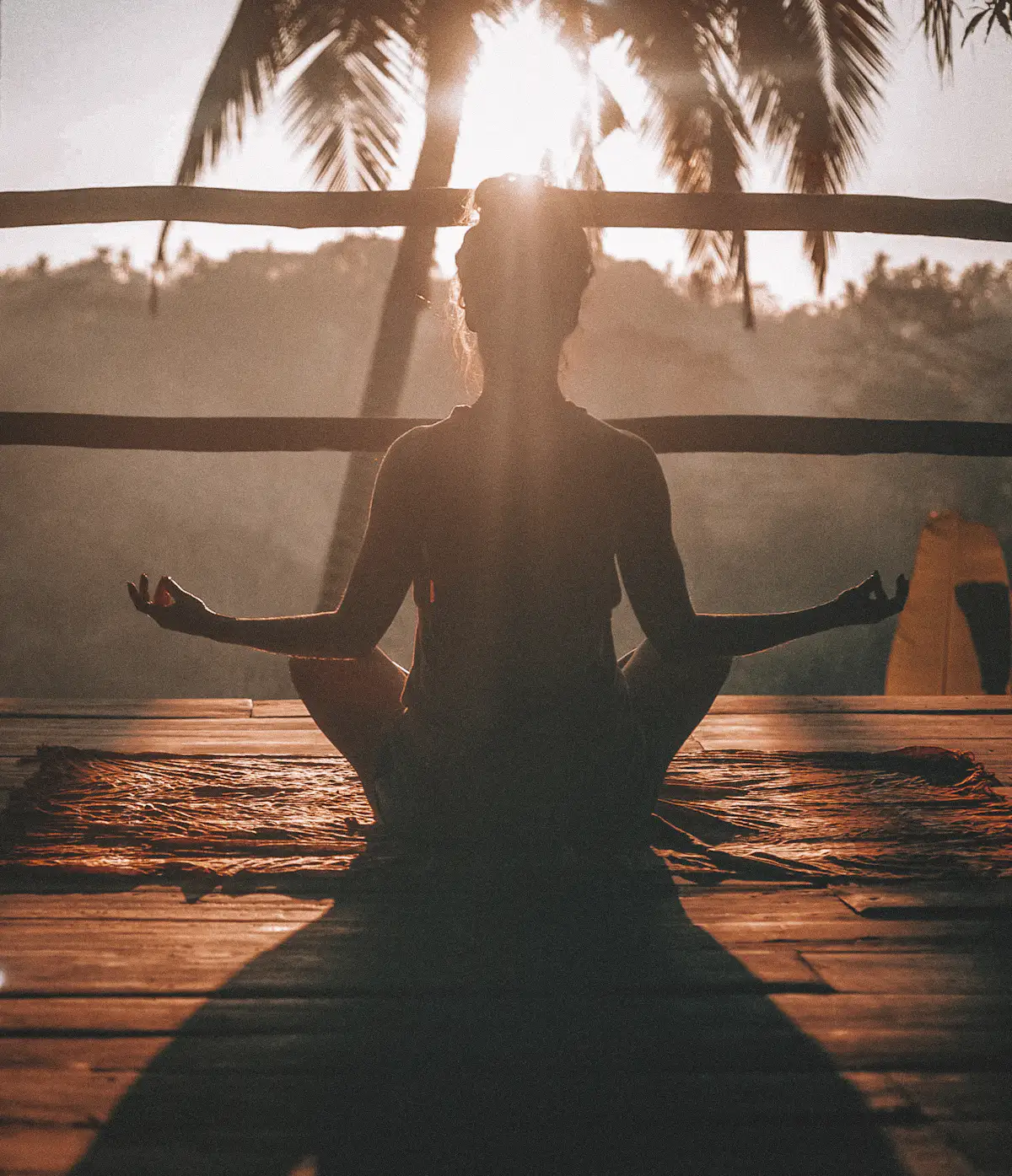 Calm person breathing outdoors with eyes closed in soft natural light