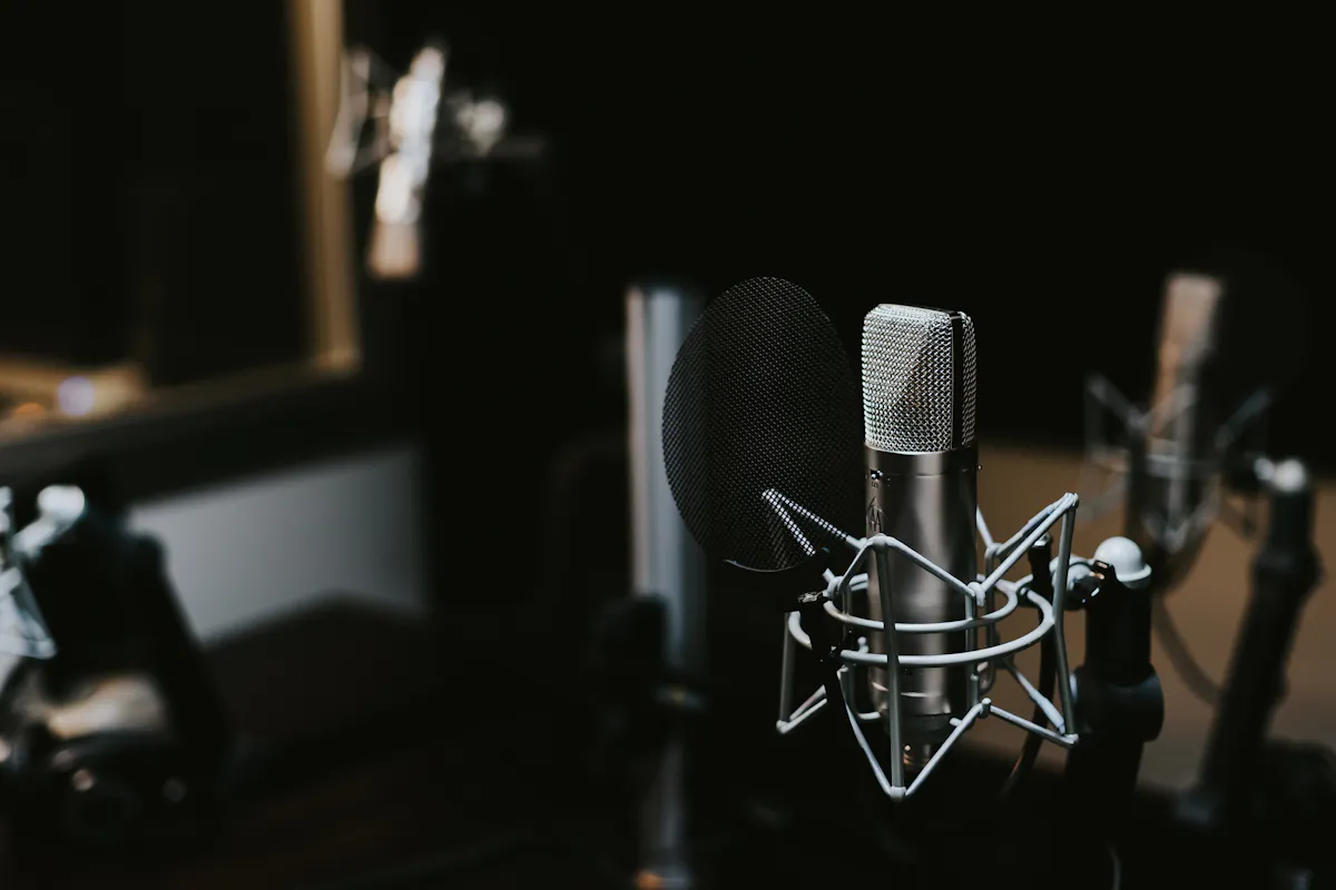 Sound waveform pulsing rhythmically against a dark background